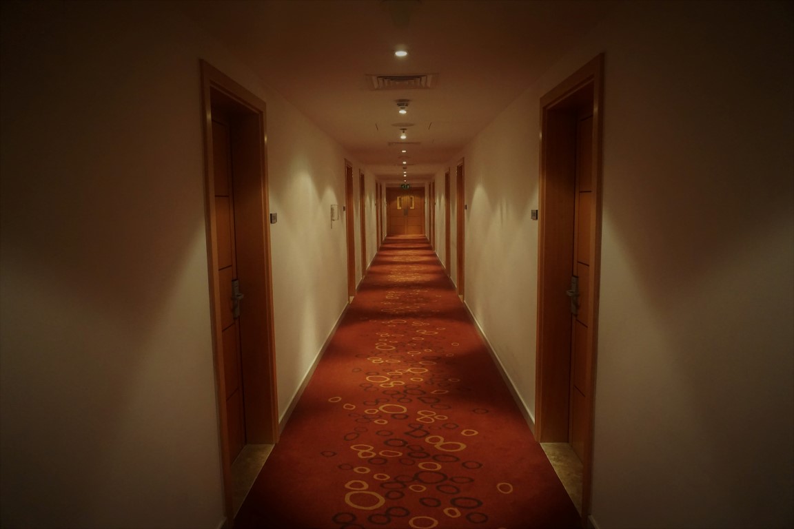 Dark Hallway to Rooms
