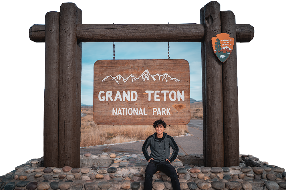 Ace and Grand Teton National Park Sign